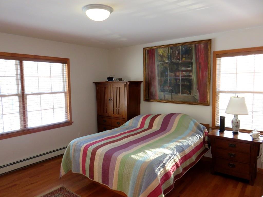 124 Werden Road Otis, MA 01253 - Photo 8 of 14 a bedroom with a bed and a window