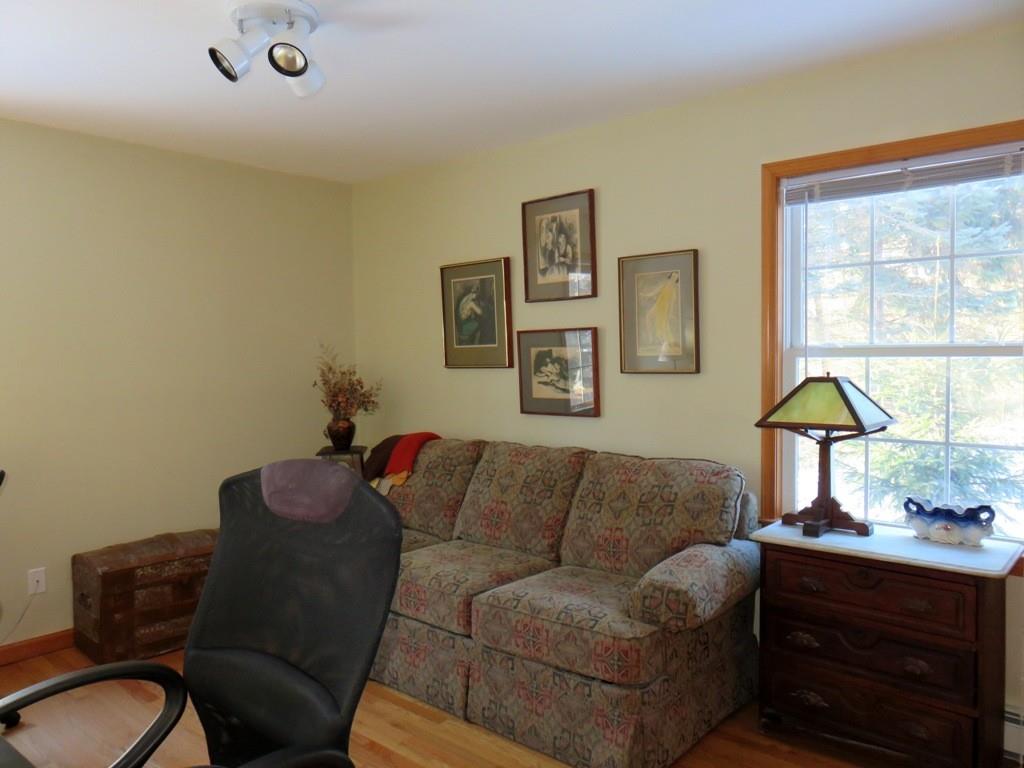 124 Werden Road Otis, MA 01253 - Photo 9 of 14 a living room with furniture and a window