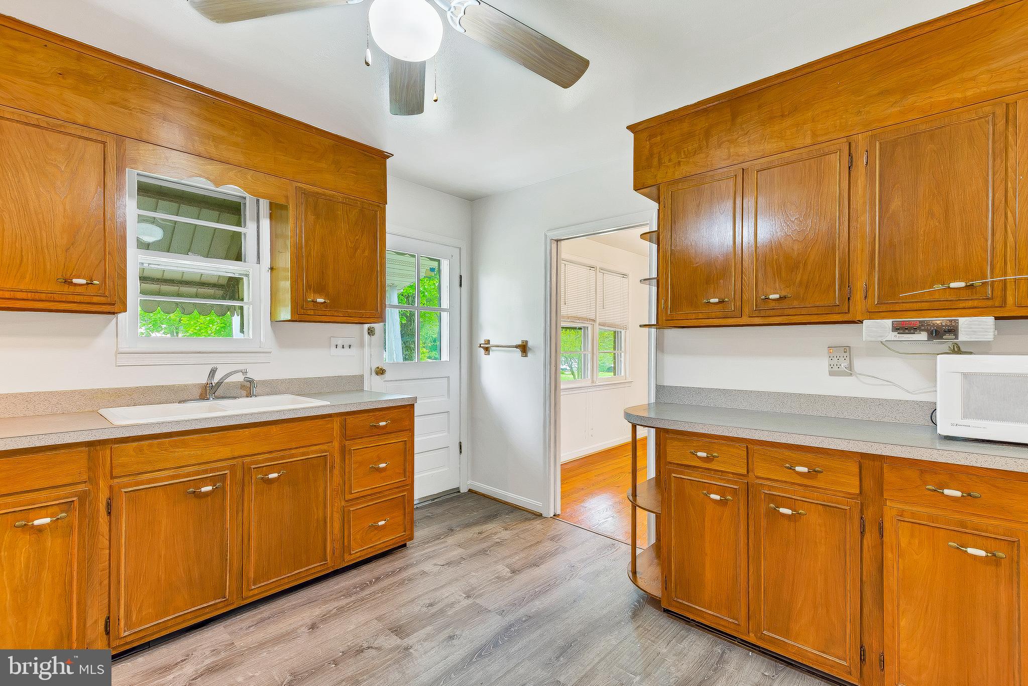 1280 Solomons Island Road North Prince Frederick, MD 20639 - Photo 9 of 24 Kitchen with door to back yard