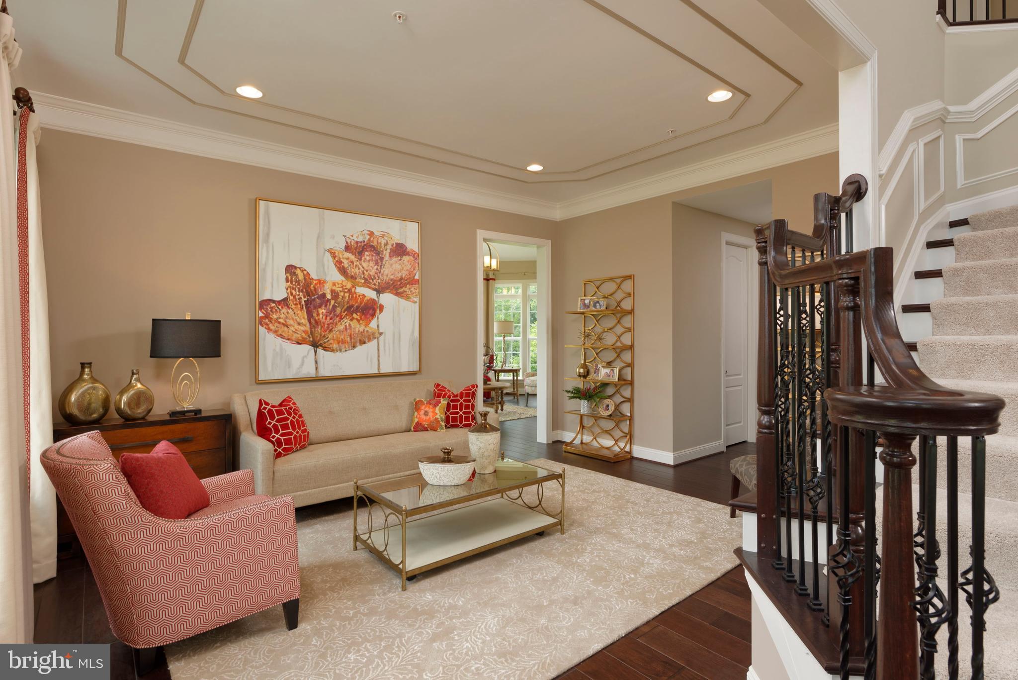 13044 Highland Road Highland, MD 20777 - Photo 4 of 11 a living room with furniture and a flat screen tv