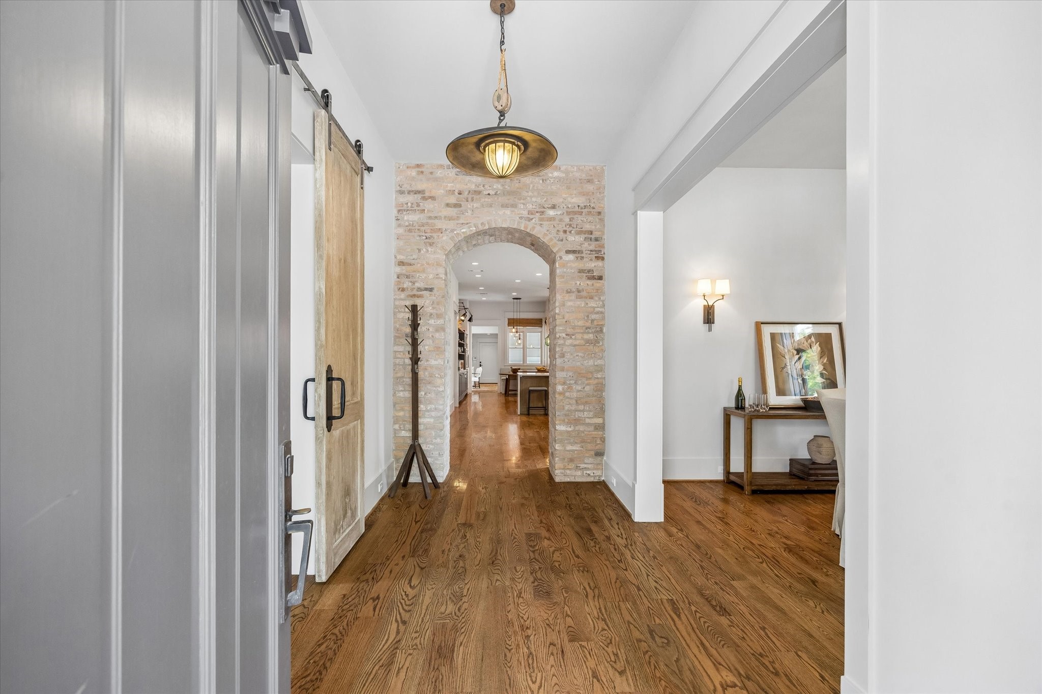 1101 Omar Street Houston, TX 77009 - Photo 6 of 46 Entry spaces showcase the home’s timeless architecture, natural light, and custom craftsmanship, creating a warm first impression that immediately feels elevated yet inviting.