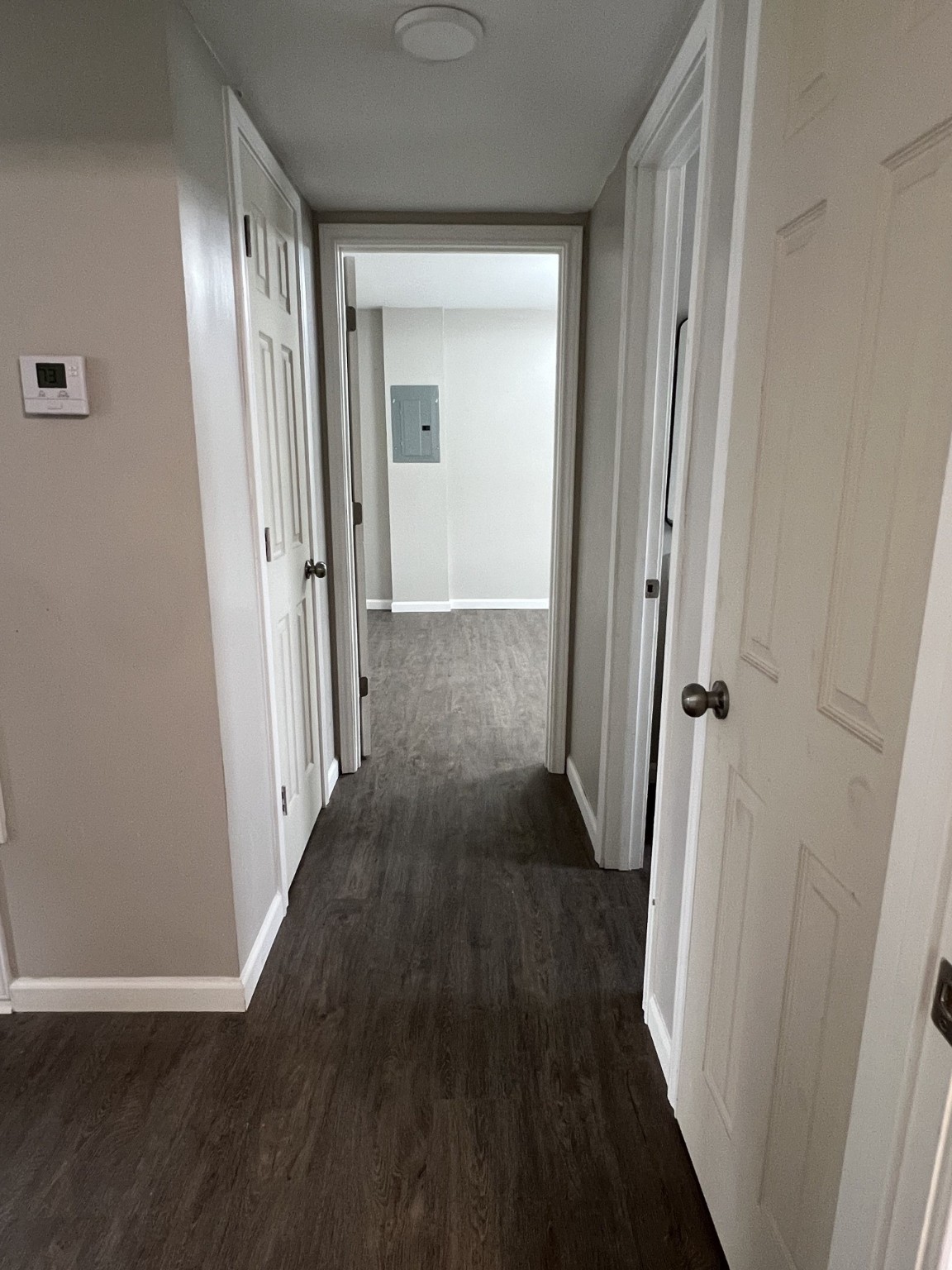 9745 Long Point Road, Unit 27 Houston, TX 77055 - Photo 12 of 17 a view of a hallway with wooden floor
