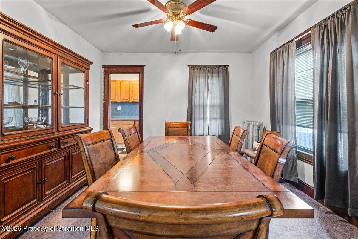 1441 Sanderson Avenue Scranton, PA 18509 - Photo 12 of 33 a living room with furniture and a chandelier