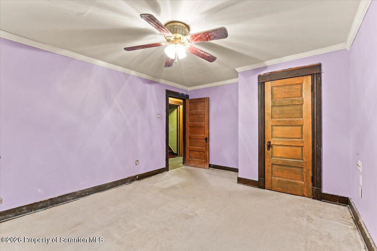 1441 Sanderson Avenue Scranton, PA 18509 - Photo 17 of 33 a view of an empty room with a ceiling fan