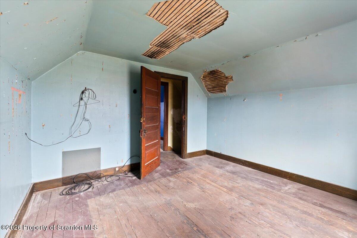1441 Sanderson Avenue Scranton, PA 18509 - Photo 25 of 33 a view of a room with wooden floor