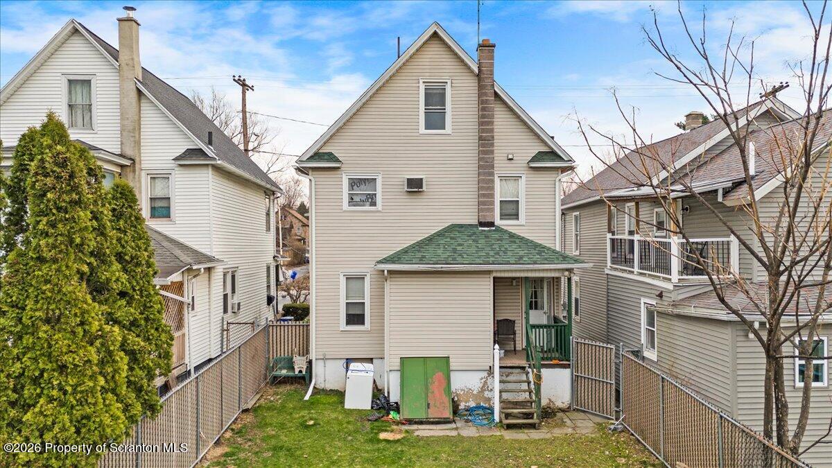 1441 Sanderson Avenue Scranton, PA 18509 - Photo 30 of 33 a front view of a house with a yard