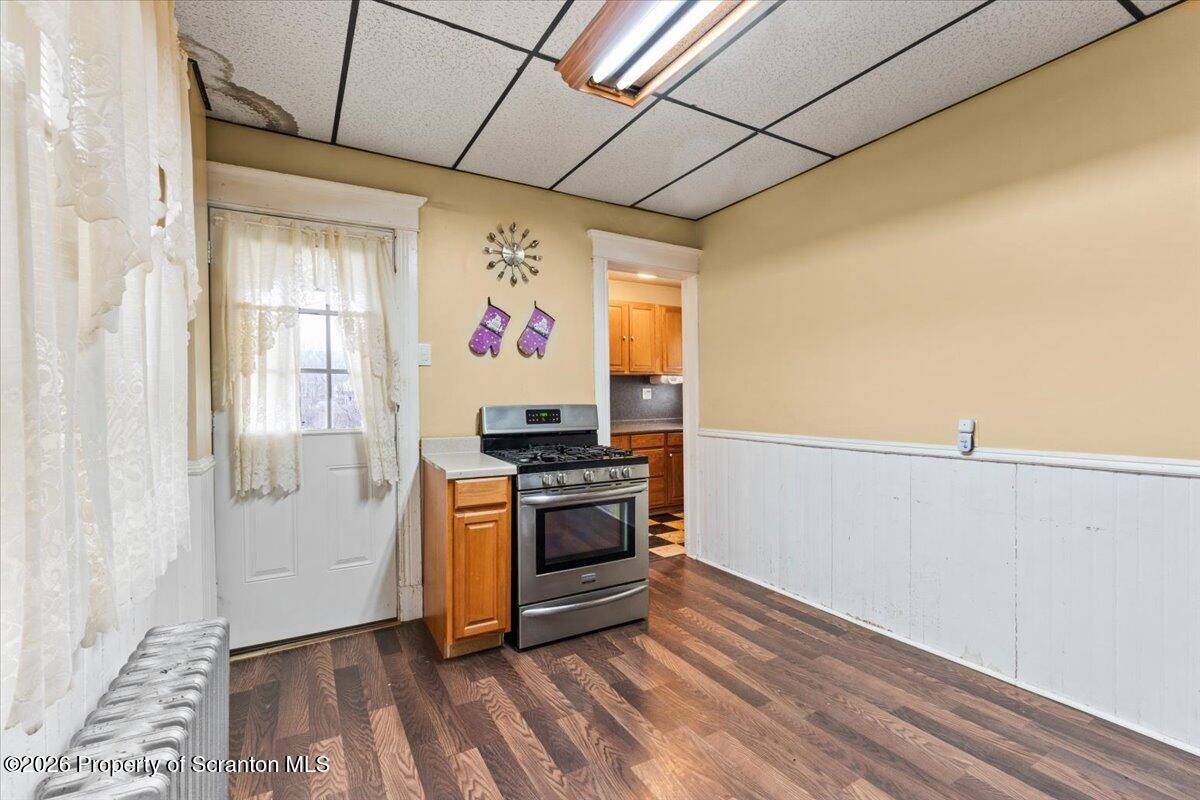 1441 Sanderson Avenue Scranton, PA 18509 - Photo 7 of 33 a kitchen with a refrigerator and a stove