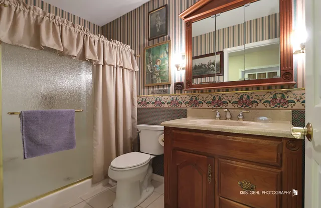 a kitchen with stainless steel appliances granite countertop a stove and a refrigerator