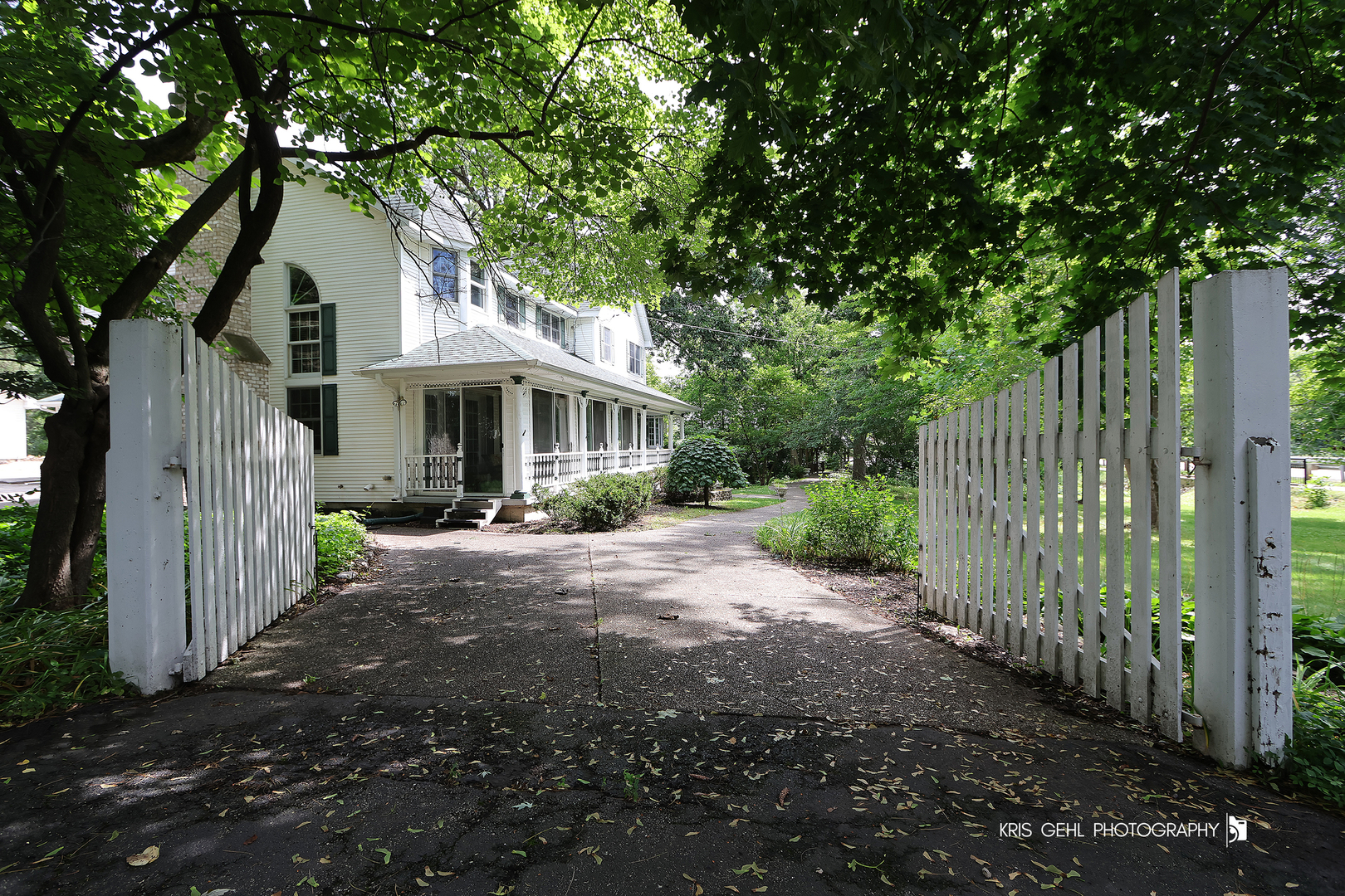 2214 Main Street Road Spring Grove, IL 60081 - Photo 3 of 53 a front view of a house with yard and green space