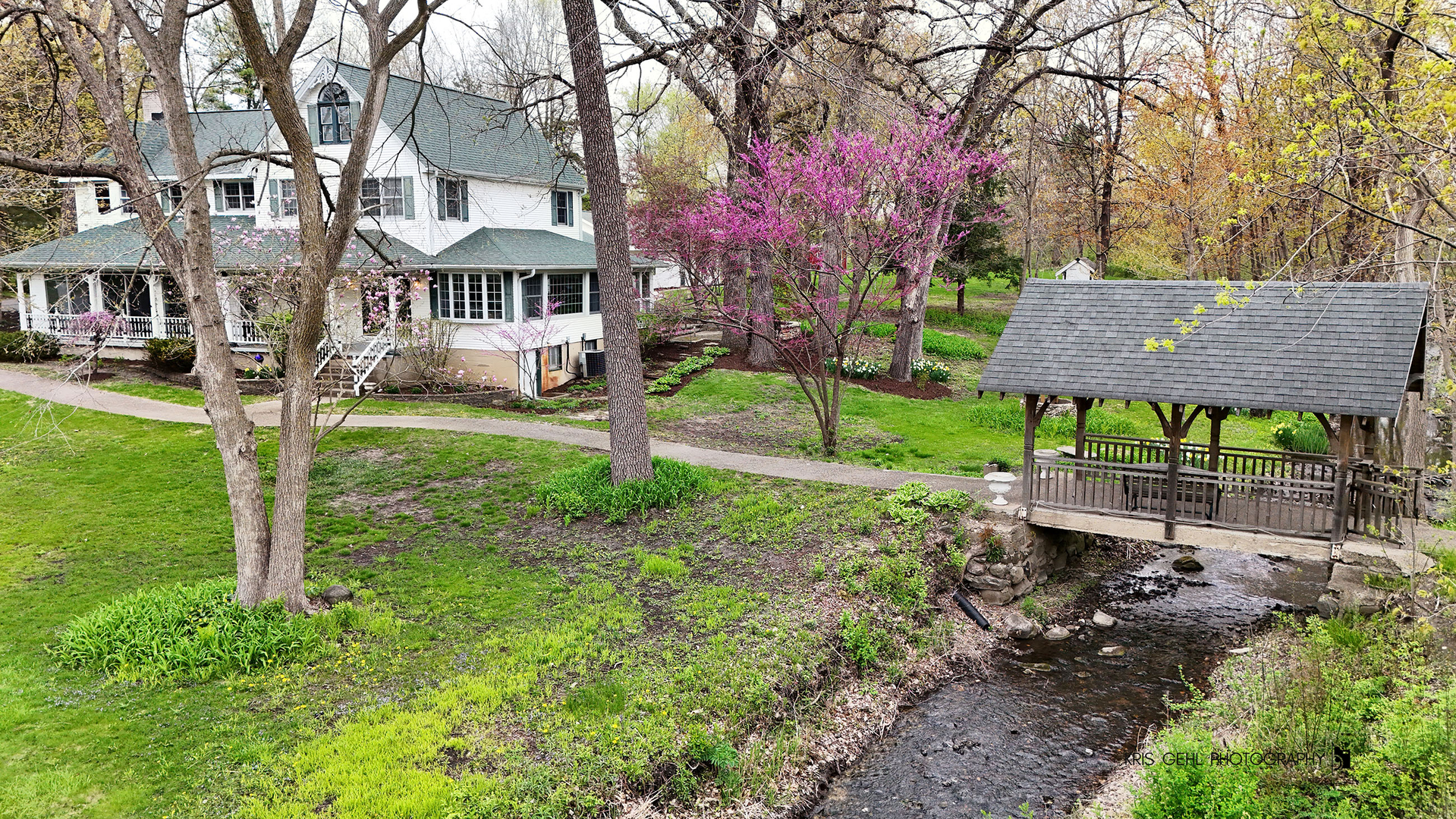 2214 Main Street Road Spring Grove, IL 60081 - Photo 38 of 53 a view of a house with a yard and a tree
