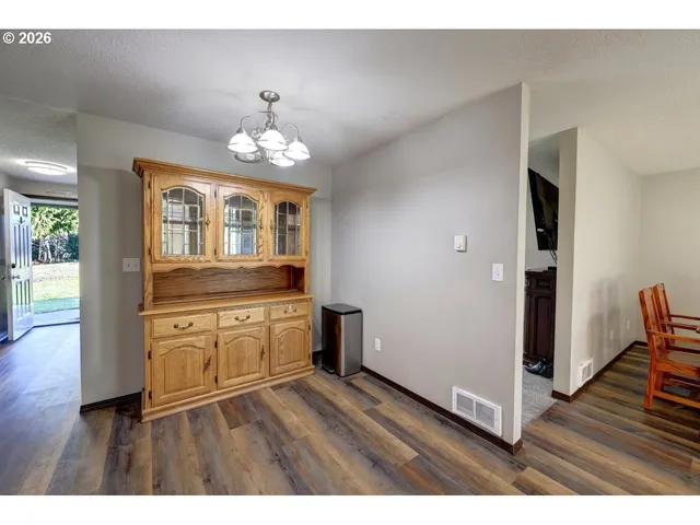 a kitchen with a stove and a microwave