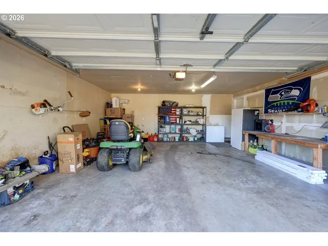 a view of a backyard with a small garden