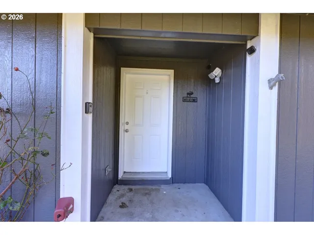 a view of a living room with furniture