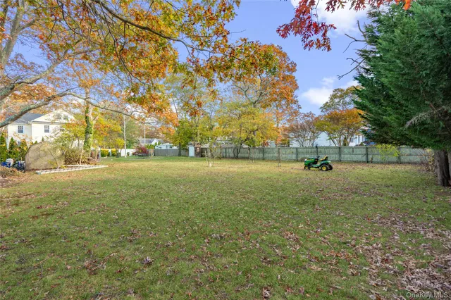 a view of outdoor space with deck and trees