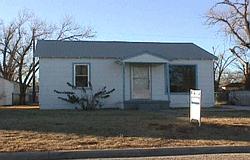 4204 South Polk Street Amarillo, TX 79110 - Photo 1 of 1 a house that has a tree in front of it