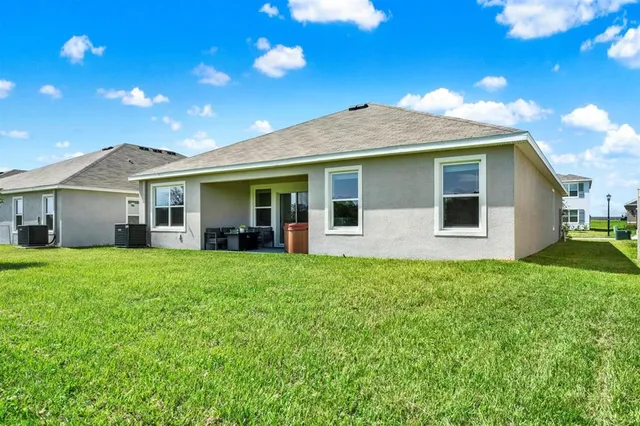 a view of a house with garden