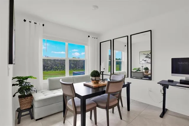a kitchen with stainless steel appliances a sink stove and refrigerator