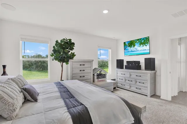 a bathroom with a double vanity sink and mirror