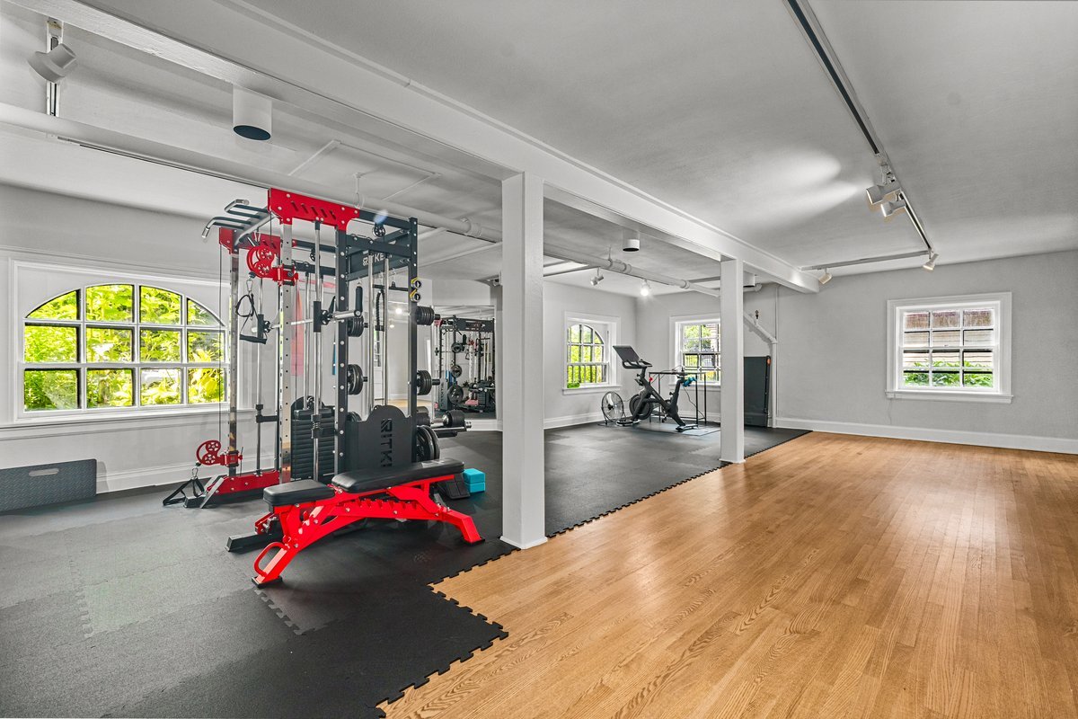 225 Hamilton Street Evanston, IL 60202 - Photo 17 of 38 a living room with furniture and a floor to ceiling window