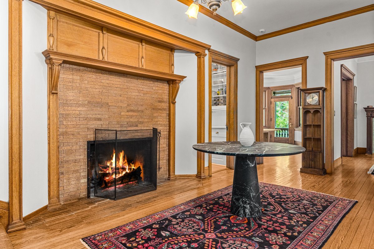 225 Hamilton Street Evanston, IL 60202 - Photo 2 of 38 a living room with furniture and a fireplace