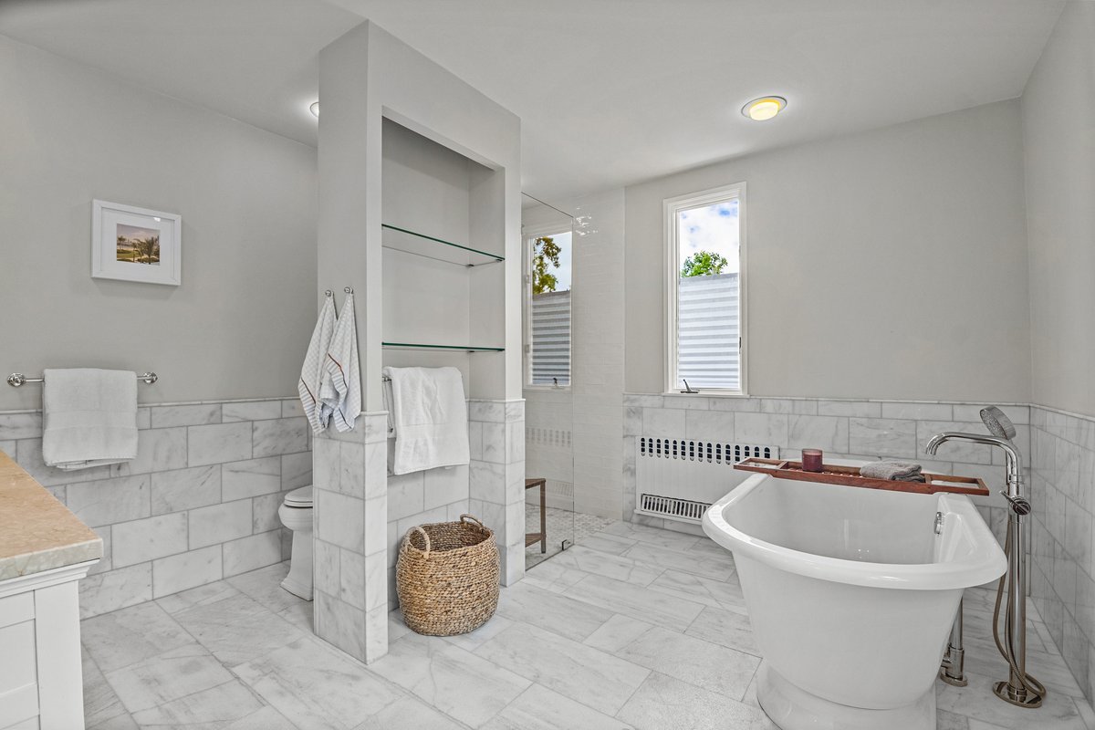 225 Hamilton Street Evanston, IL 60202 - Photo 24 of 38 a bathroom with a sink and a mirror