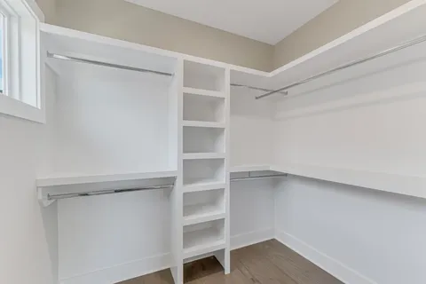 a bathroom with a sink and a window