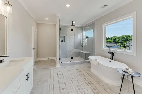 a bathroom with a toilet and a vanity