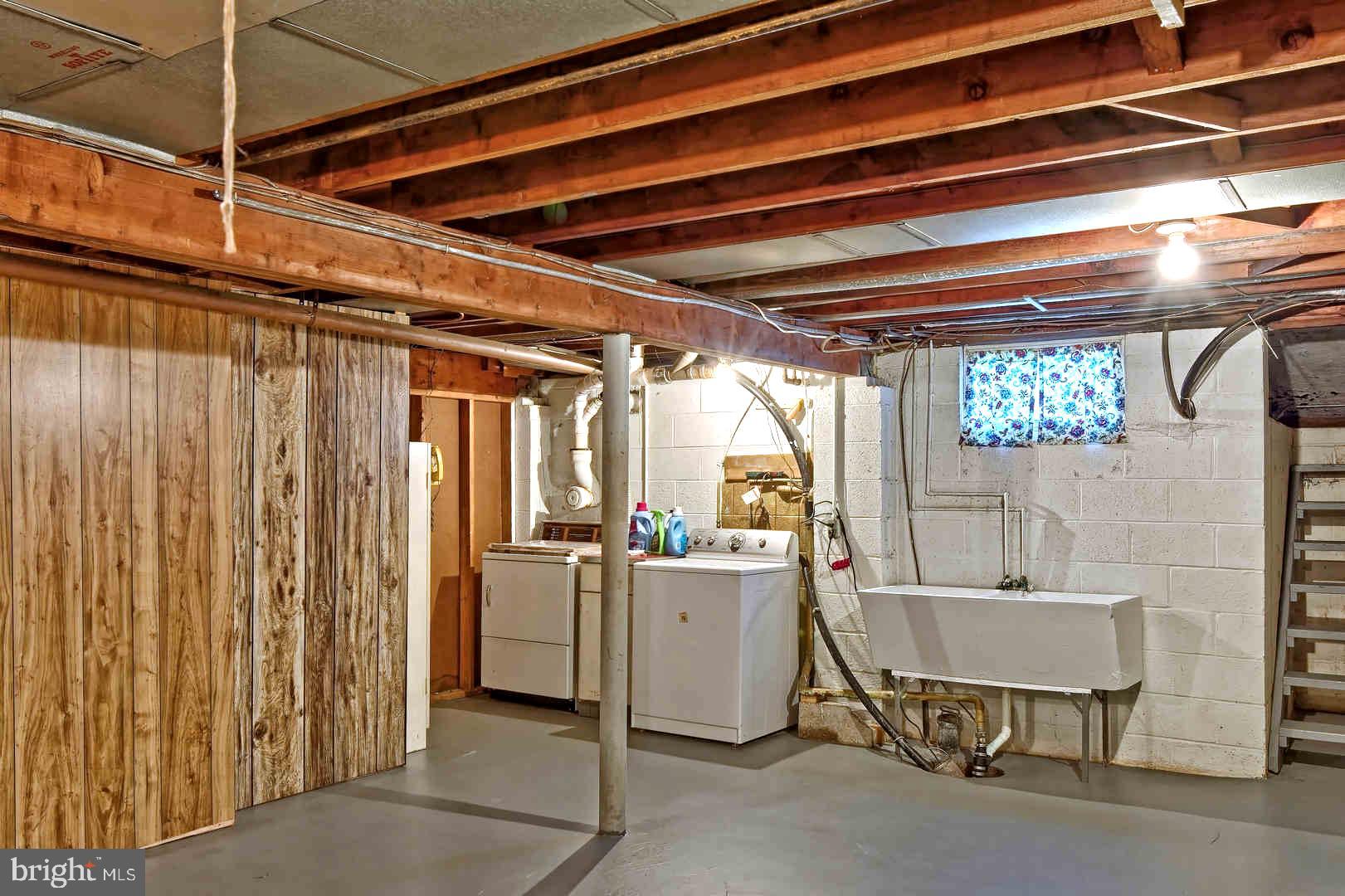 138 Eaton Road Pennsville, NJ 08070 - Photo 23 of 29 Basement Laundry with Outside Entrance