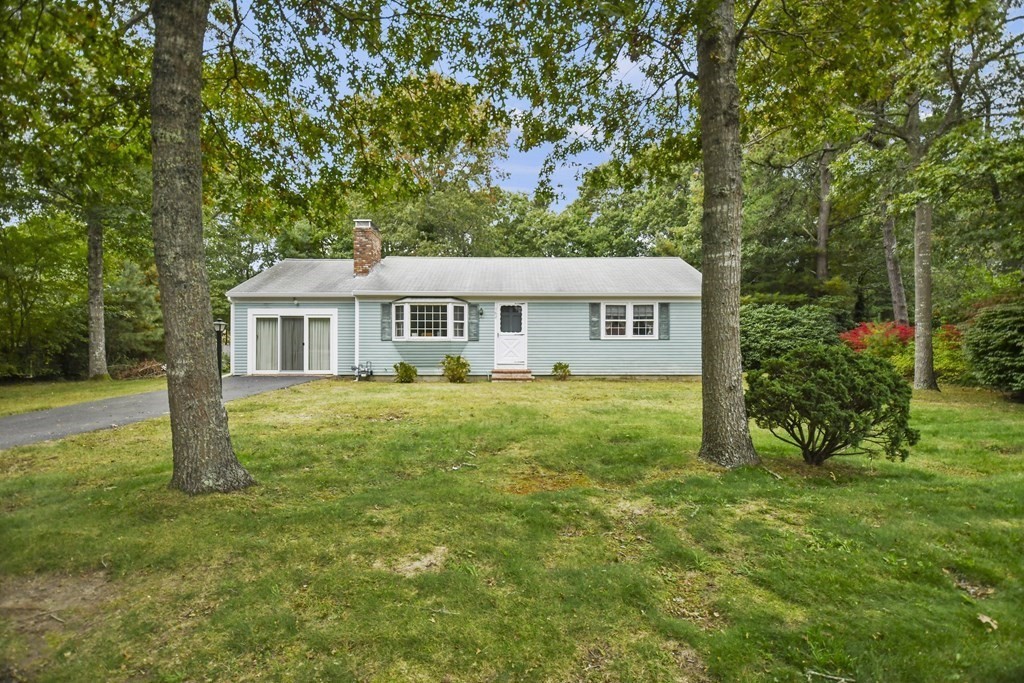 a house view with a garden space