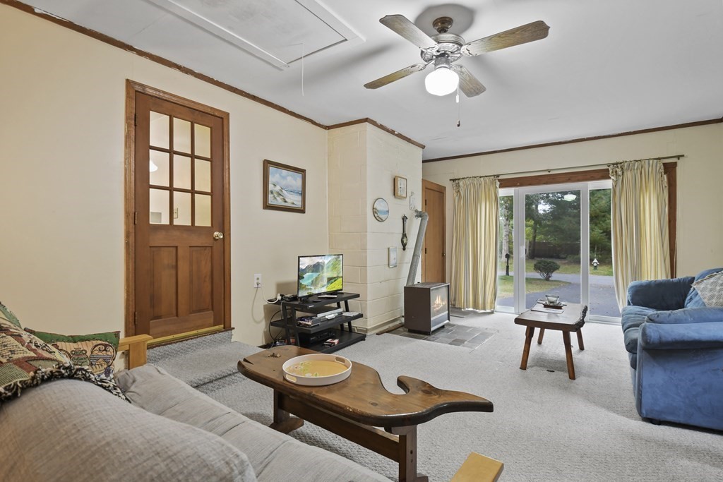 162 Cedric Road Barnstable, MA 02632 - Photo 12 of 29 a living room with furniture and a large window
