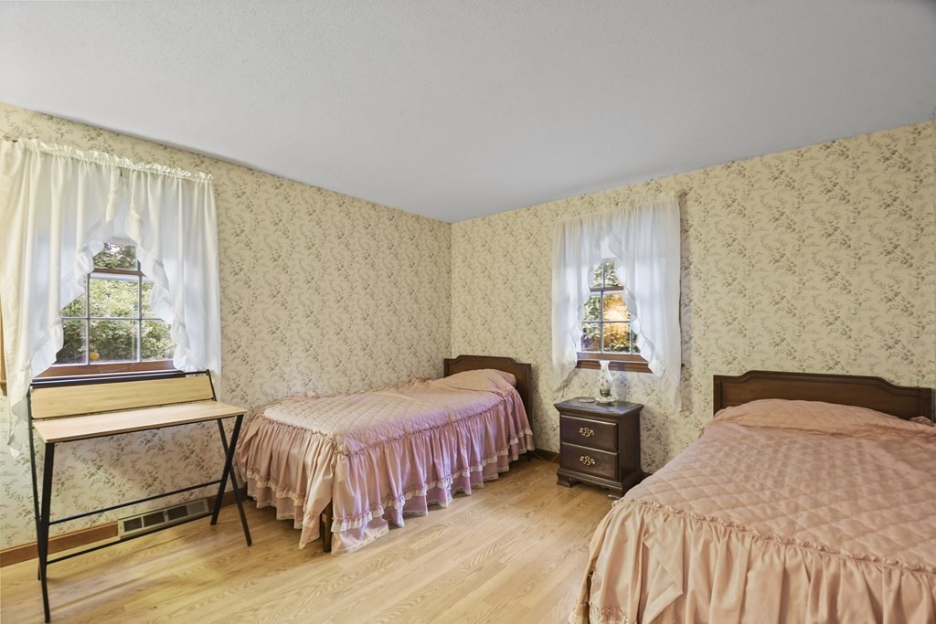 162 Cedric Road Barnstable, MA 02632 - Photo 19 of 29 a bedroom with two beds and a window