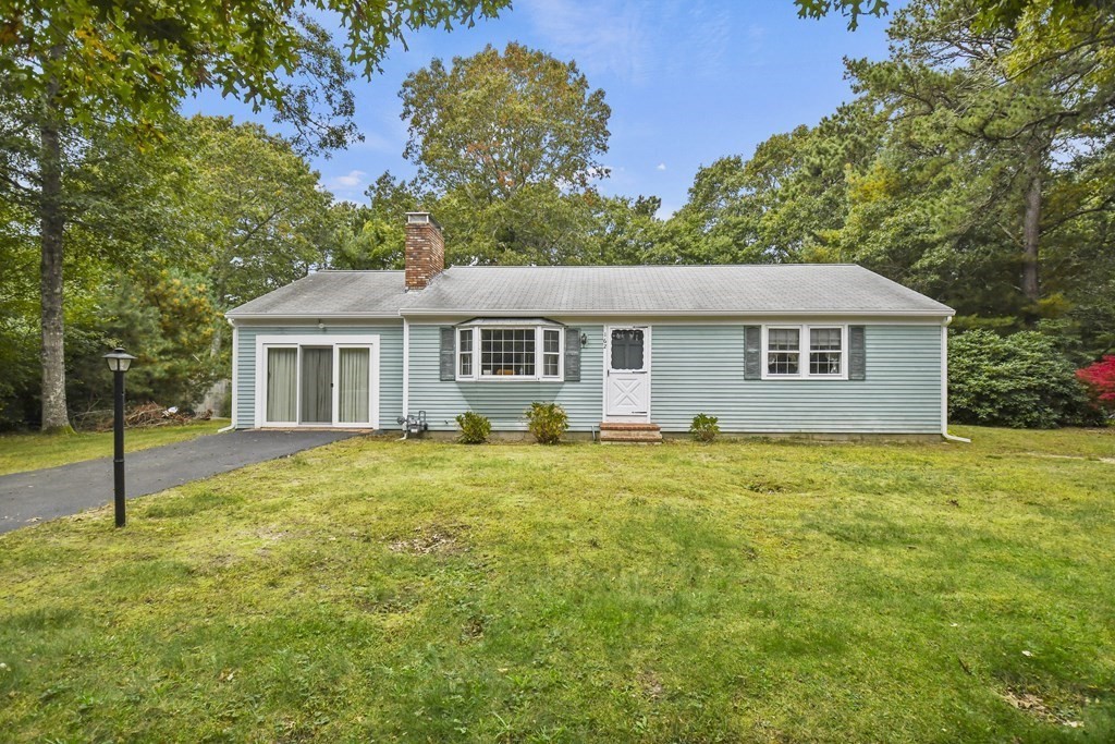 162 Cedric Road Barnstable, MA 02632 - Photo 2 of 29 a front view of a house with a yard