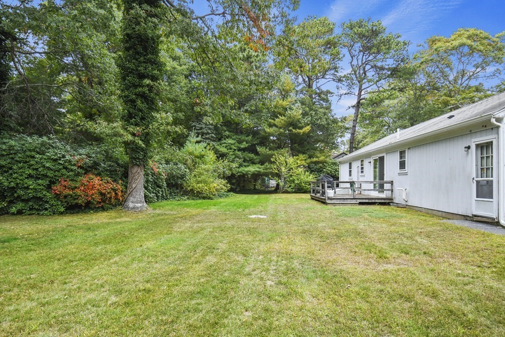 162 Cedric Road Barnstable, MA 02632 - Photo 29 of 29 a house with a tree in front of it