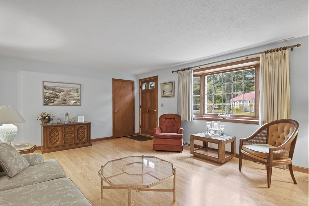 162 Cedric Road Barnstable, MA 02632 - Photo 8 of 29 a living room with furniture and a large window