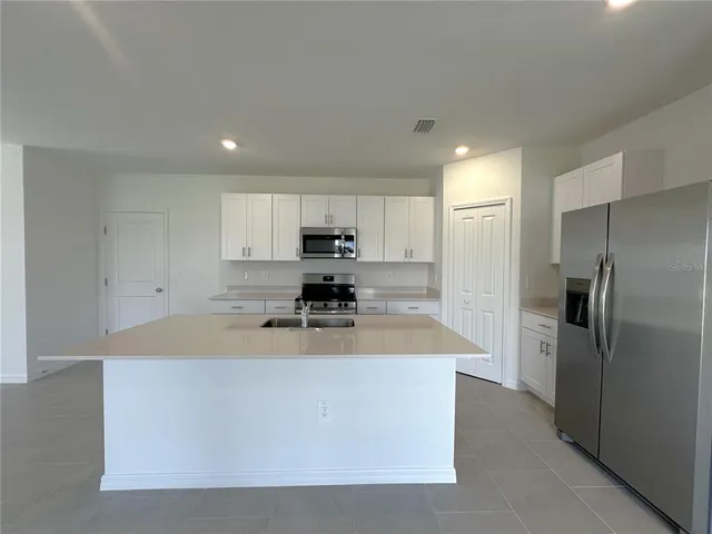 a bathroom with a sink and toilet
