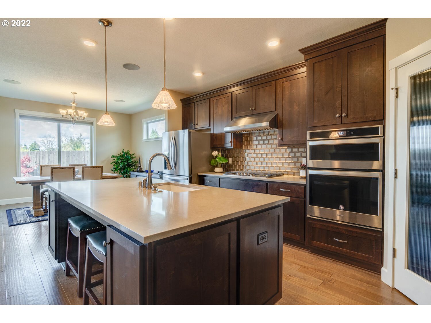 4326 South 11th Way Ridgefield, WA 98642 - Photo 12 of 26 a kitchen with kitchen island a sink stove and refrigerator