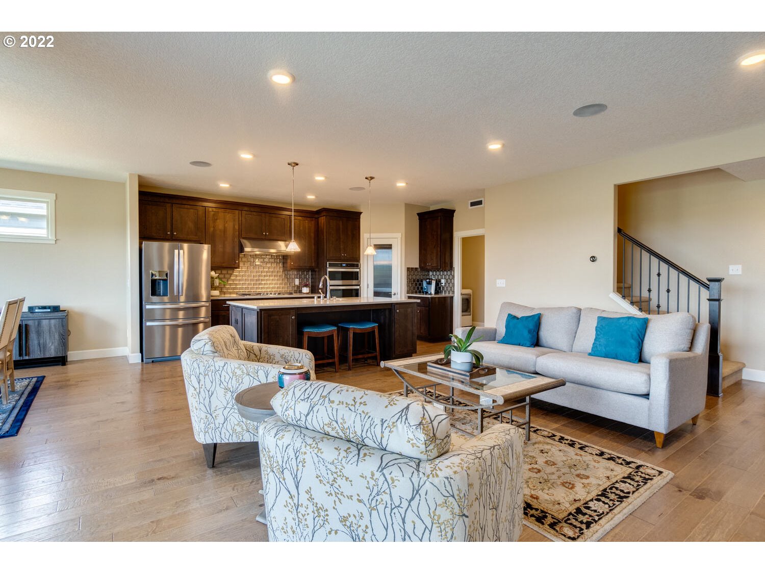 4326 South 11th Way Ridgefield, WA 98642 - Photo 13 of 26 a living room with furniture and kitchen view