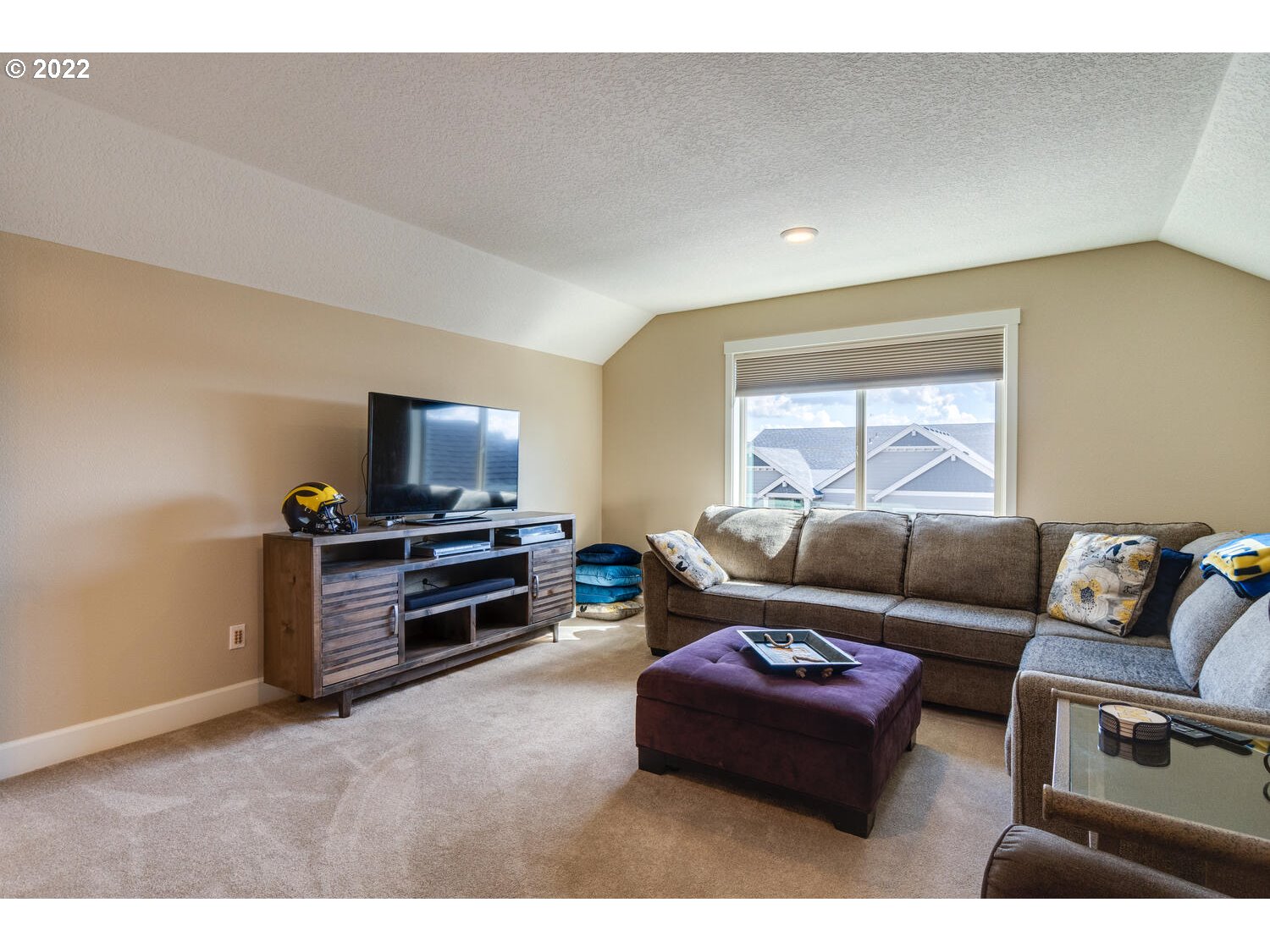 4326 South 11th Way Ridgefield, WA 98642 - Photo 15 of 26 a living room with furniture and a flat screen tv