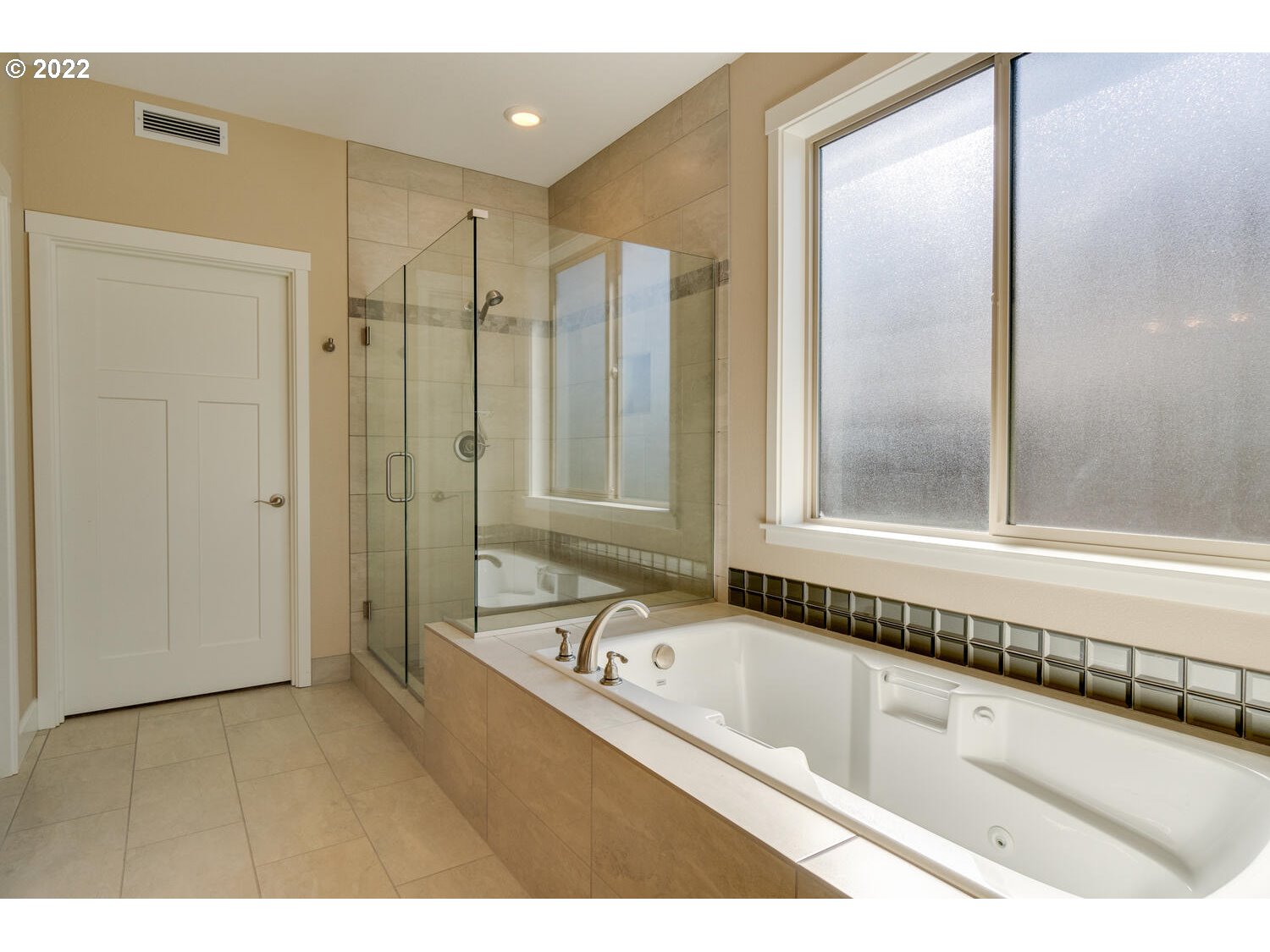 4326 South 11th Way Ridgefield, WA 98642 - Photo 18 of 26 a bathroom with a bathtub and a sink
