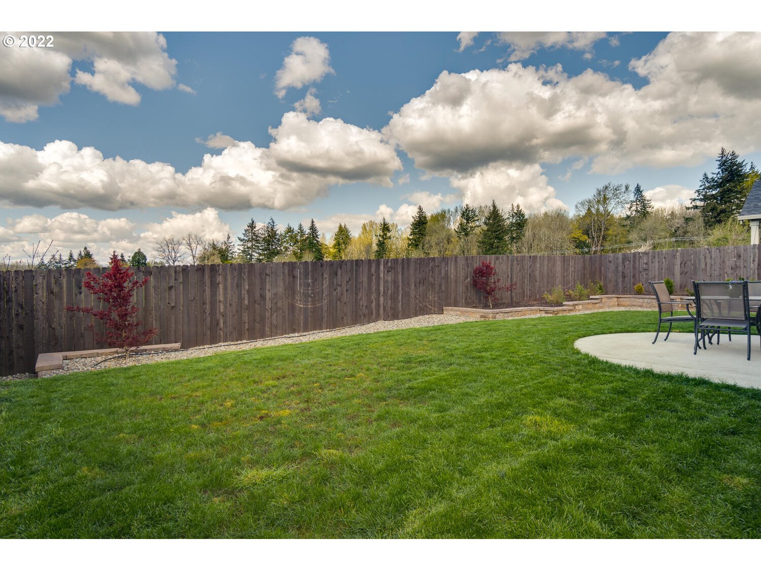 4326 South 11th Way Ridgefield, WA 98642 - Photo 23 of 26 a view of a backyard with a garden