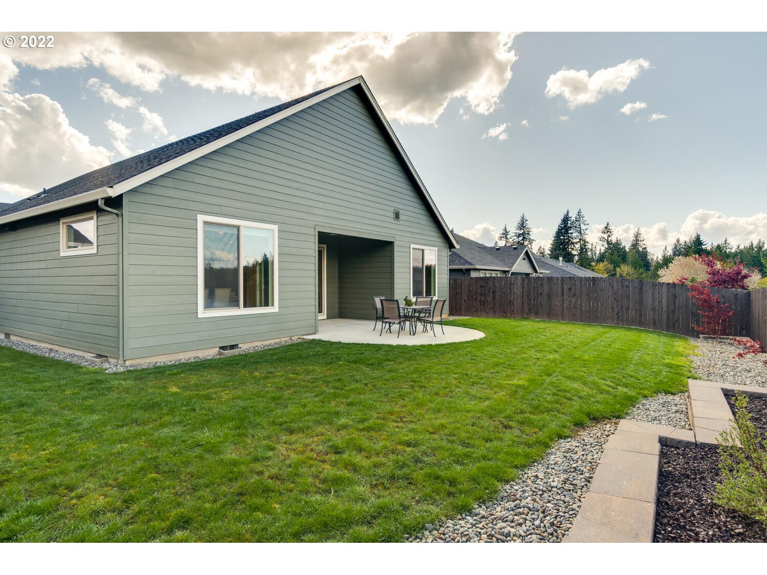 4326 South 11th Way Ridgefield, WA 98642 - Photo 25 of 26 a view of a house with backyard and garden