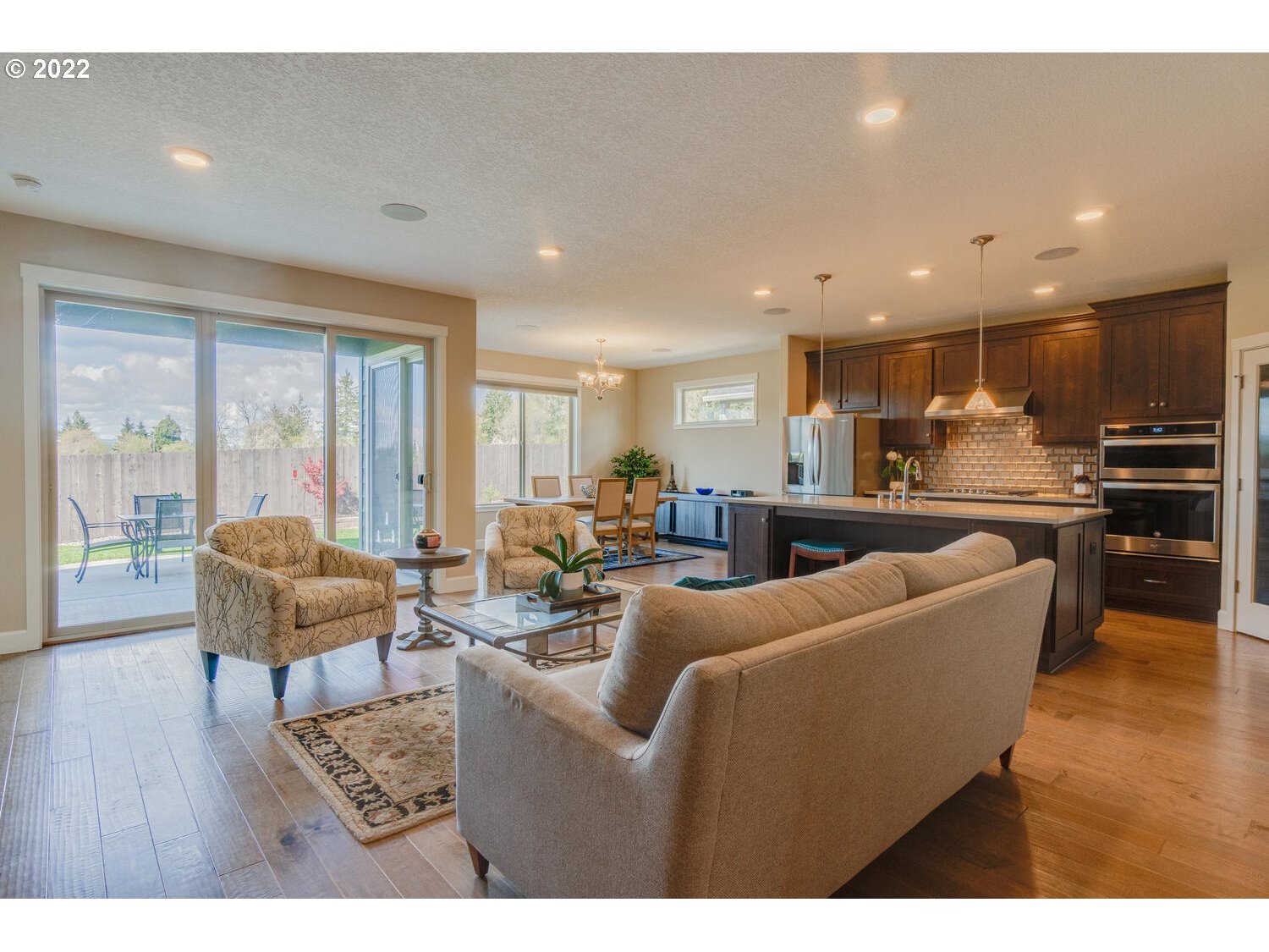 4326 South 11th Way Ridgefield, WA 98642 - Photo 10 of 26 a living room with furniture and a large window
