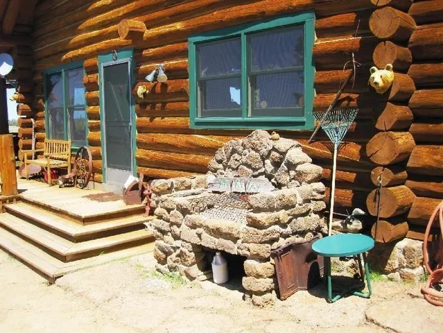 a kitchen with a sink a counter top space and a window