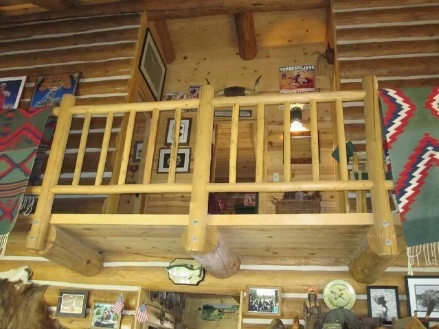 a backyard of a house with outdoor seating