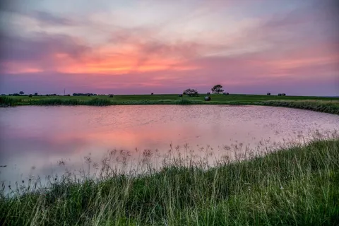a view of a lake with a houses