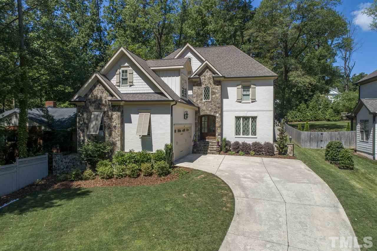 1007 Gardner Street Raleigh, NC 27607 - Photo 1 of 3 a front view of a house with a yard