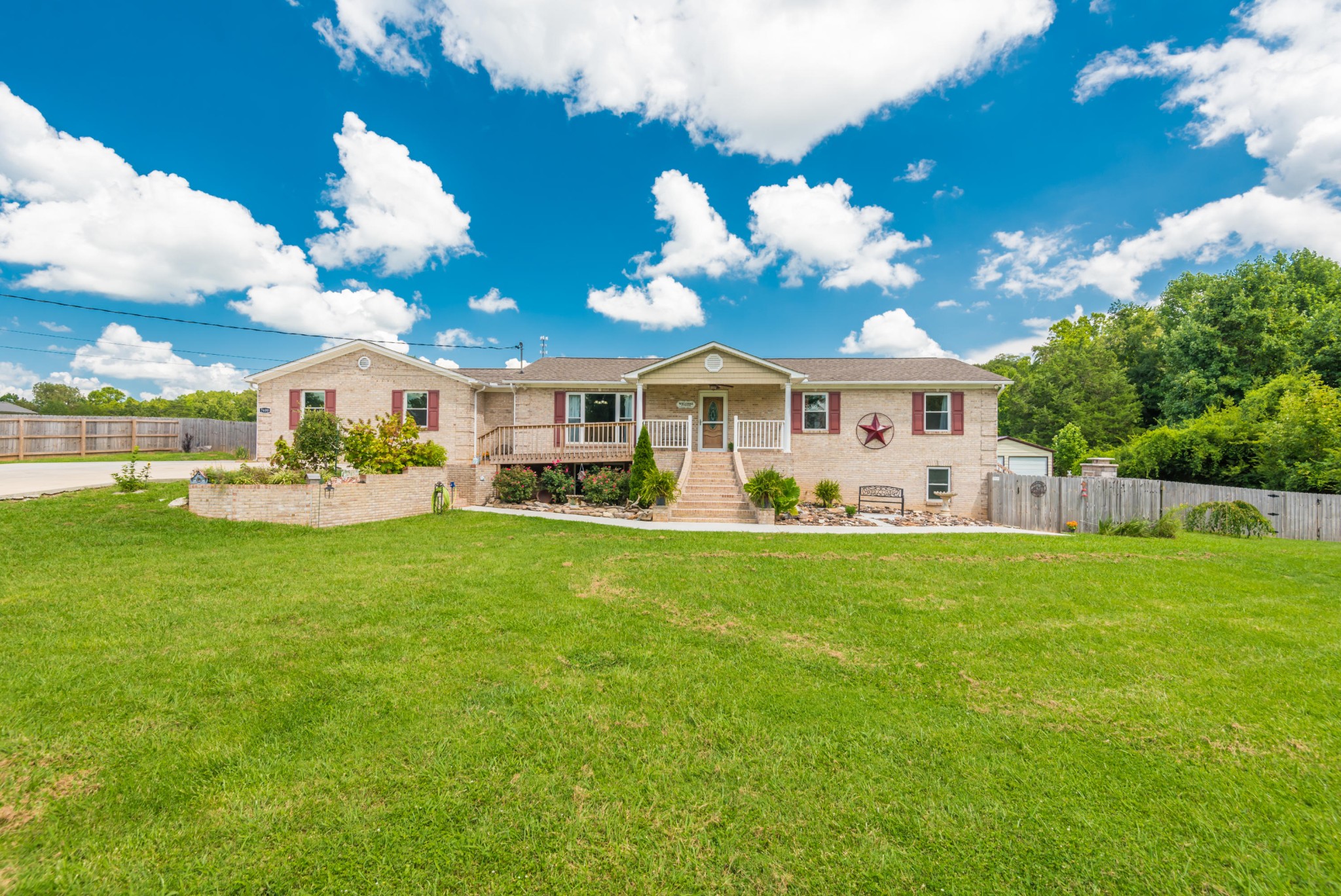 7400 Clapps Chapel Road Corryton, TN 37721 - Photo 1 of 40 a front view of a house with garden