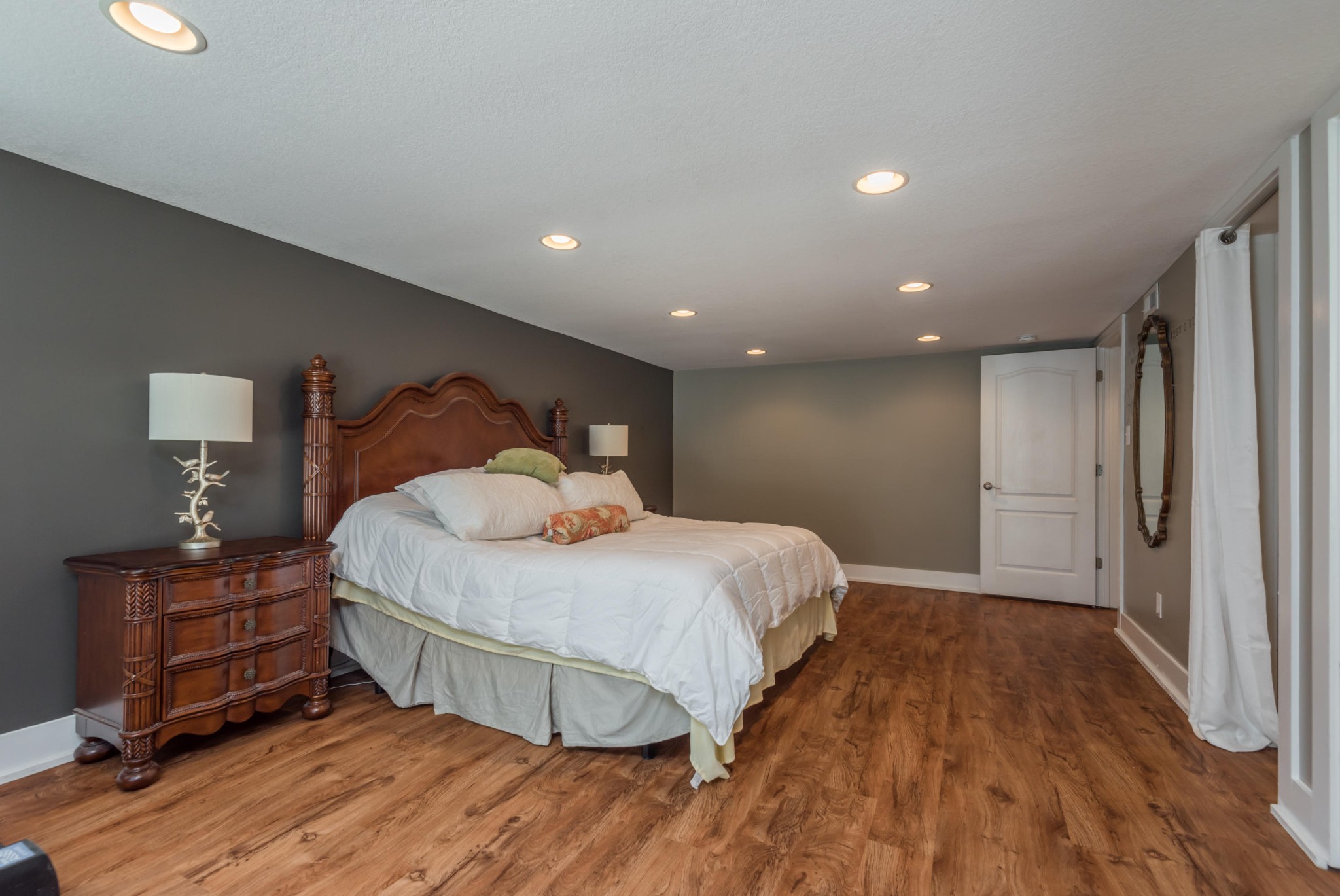 7400 Clapps Chapel Road Corryton, TN 37721 - Photo 24 of 40 a bedroom with a bed and wooden floor