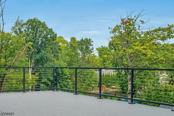 a view of a balcony with an outdoor space