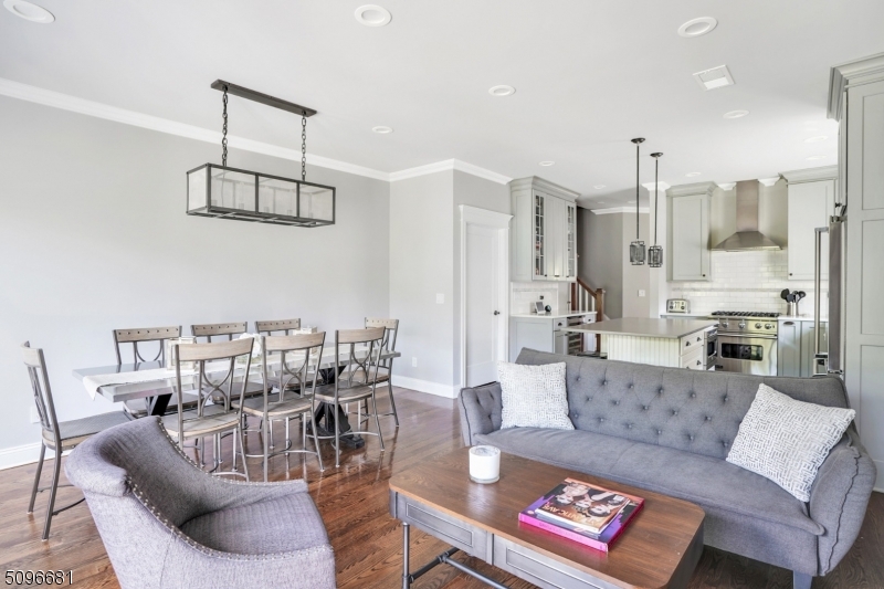 17 Spring Street Millburn, NJ 07041 - Photo 9 of 16 a living room with furniture and a view of kitchen